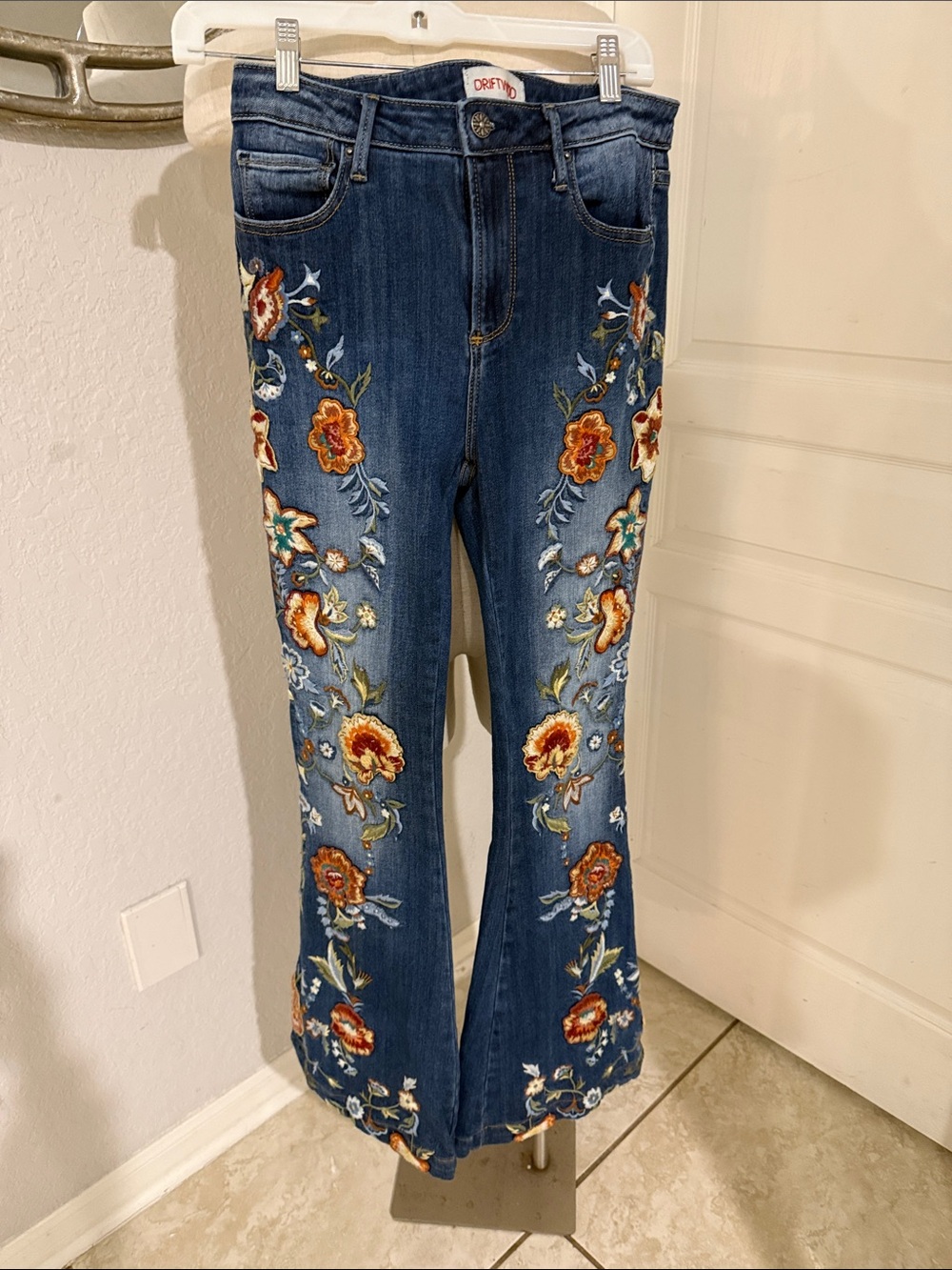 Driftwood Anthropologie embroidered flare jeans